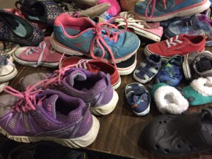 Children's shoes for families evacuated in the wildfires.